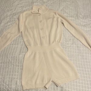 Long sleeved knitted romper.